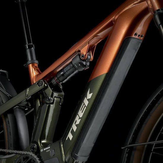 Trek Powerfly FS+ 4 600wh sähkömaastopyörä varusteltu oranssi viistoputki, linkusto ja iskunvaimennin