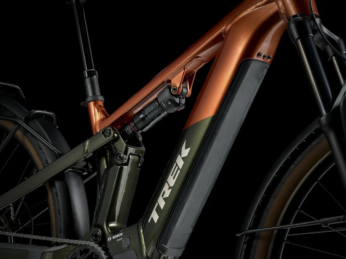 Trek Powerfly FS+ 4 600wh sähkömaastopyörä varusteltu oranssi viistoputki, linkusto ja iskunvaimennin